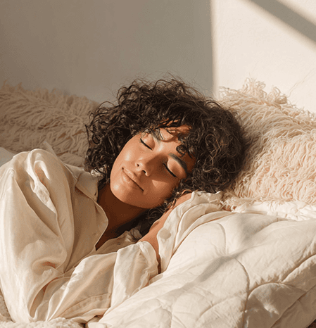 Sunlit peaceful morning bedroom scene with soft natural light and a calm, cozy atmosphere