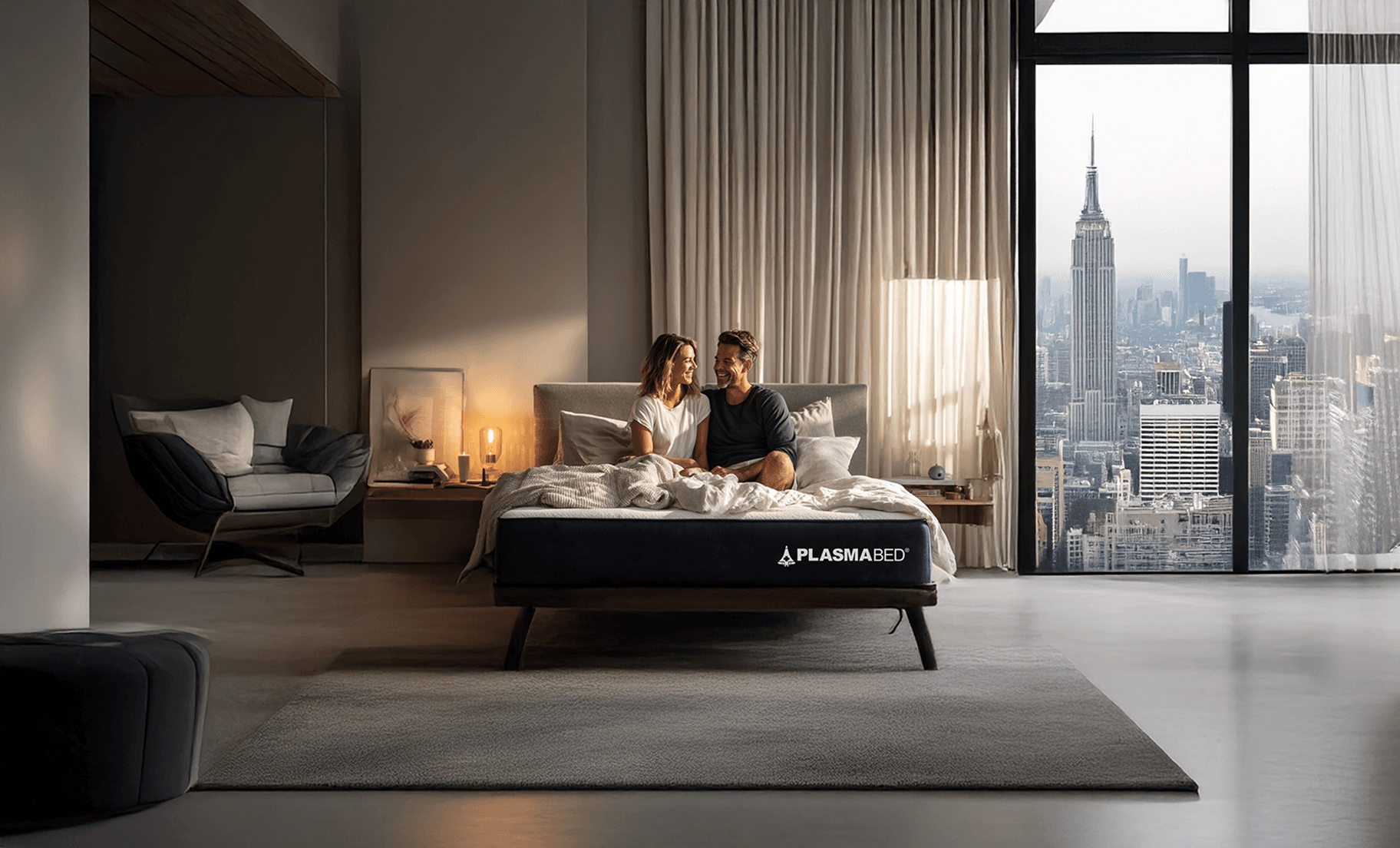 Couple relaxing on a PlasmaBed mattress, showcasing advanced gel pressure-relief and premium comfort