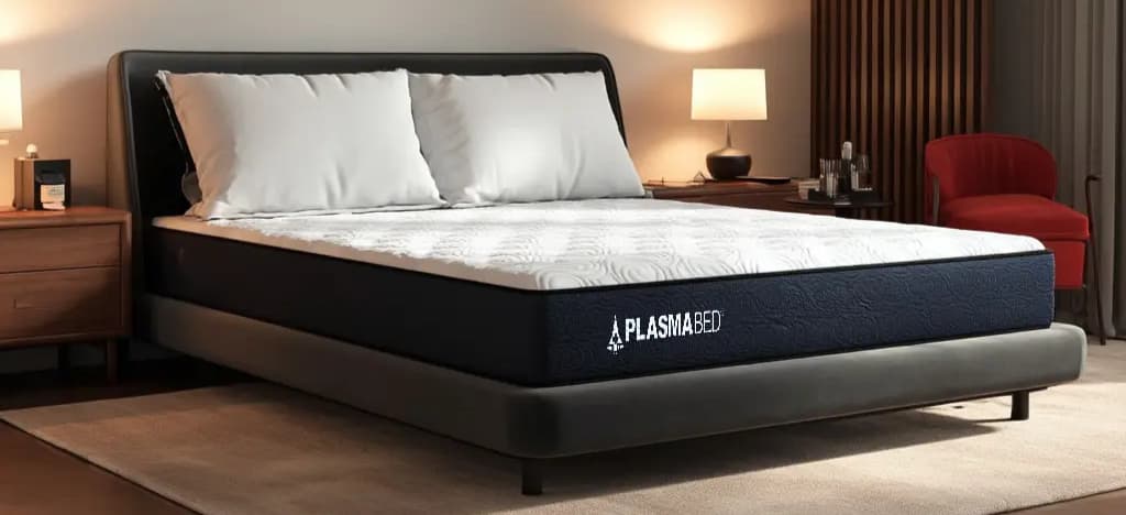 Plasmabed cooling mattress displayed on a modern bed frame with breathable, temperature-regulating design